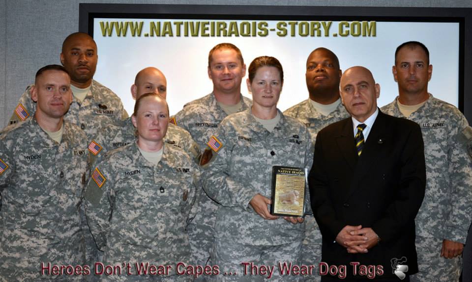 Army members with book.